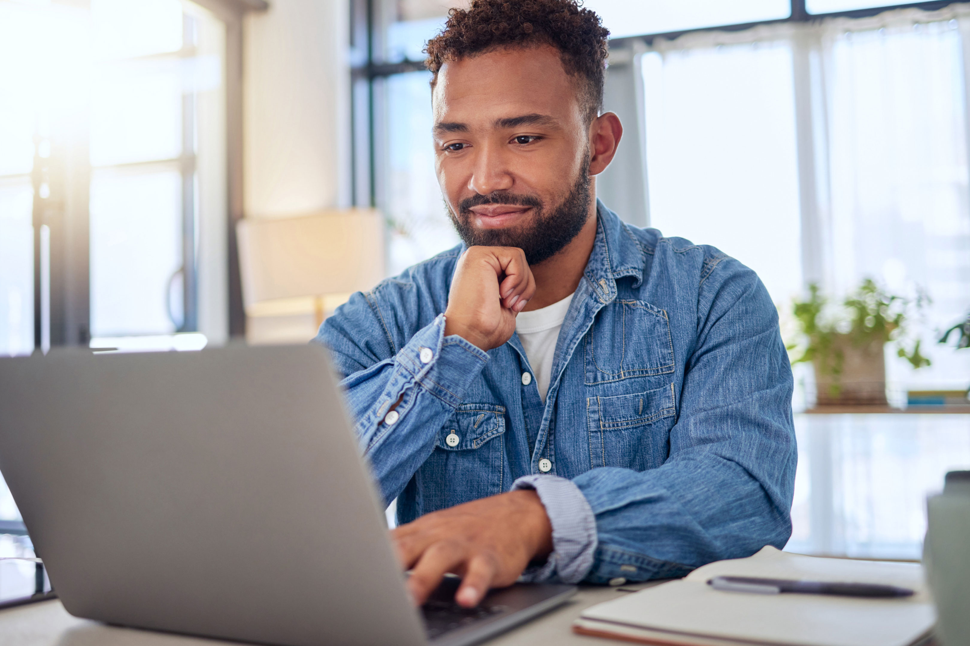 man reading latest news, trends, research and announcements